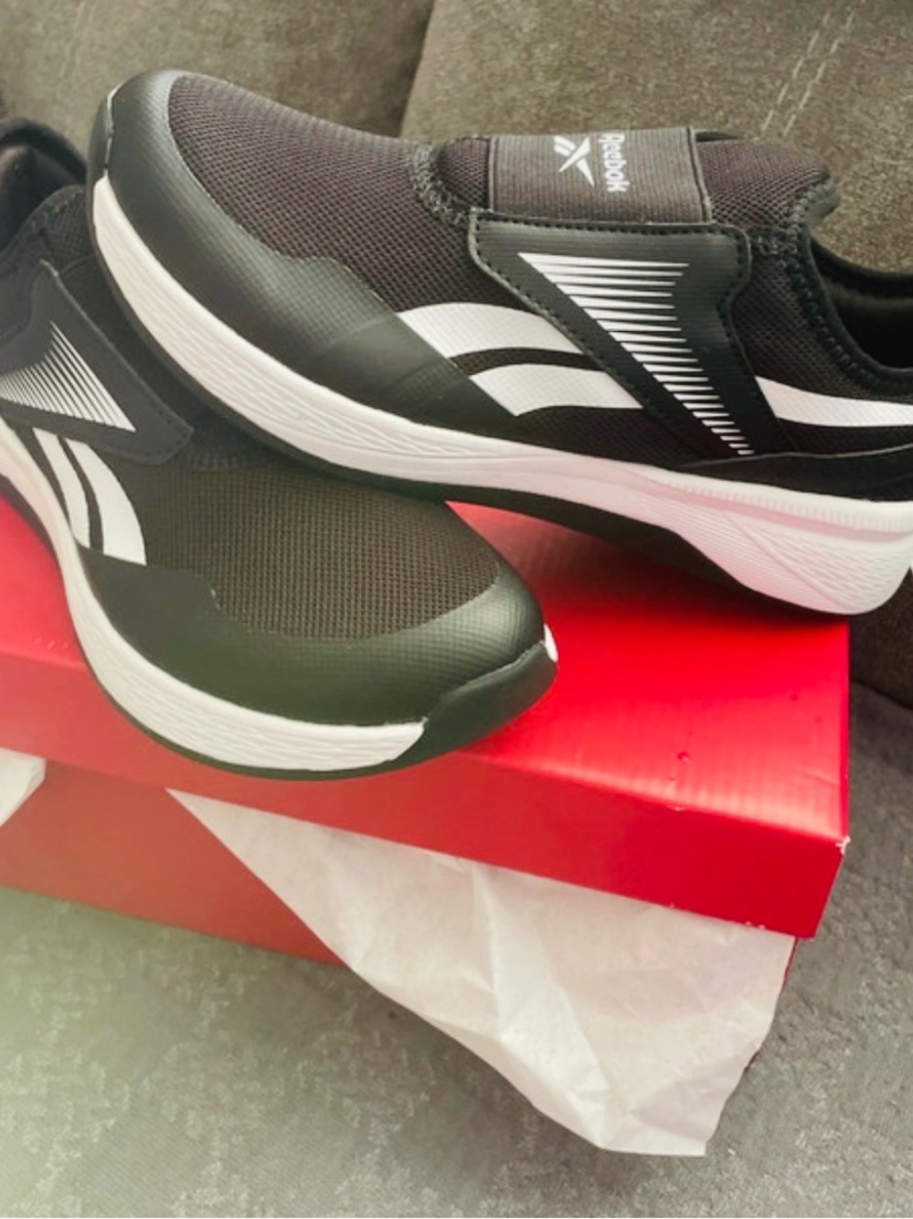 Reebok kids Black and White Slip-On Athletic Sneakers